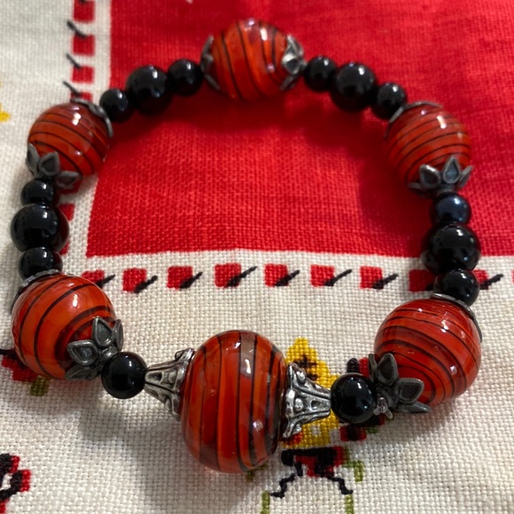 Artisan Jewelry - Art Glass Orange And Black Beaded Stretch Bracelet